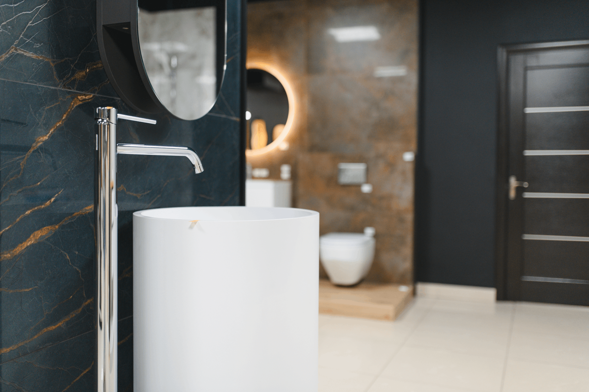 Finished bathroom with toilet and plumbing fixtures